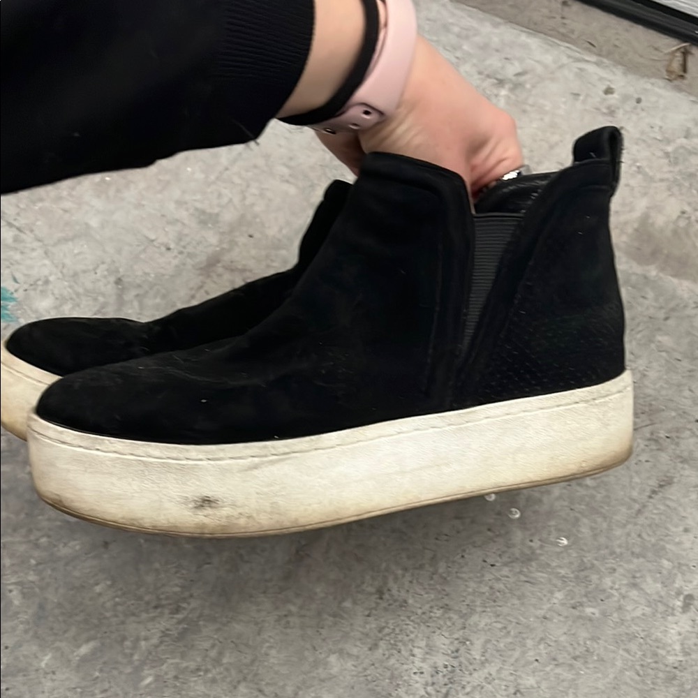 Black High-Top Sneakers with White Soles